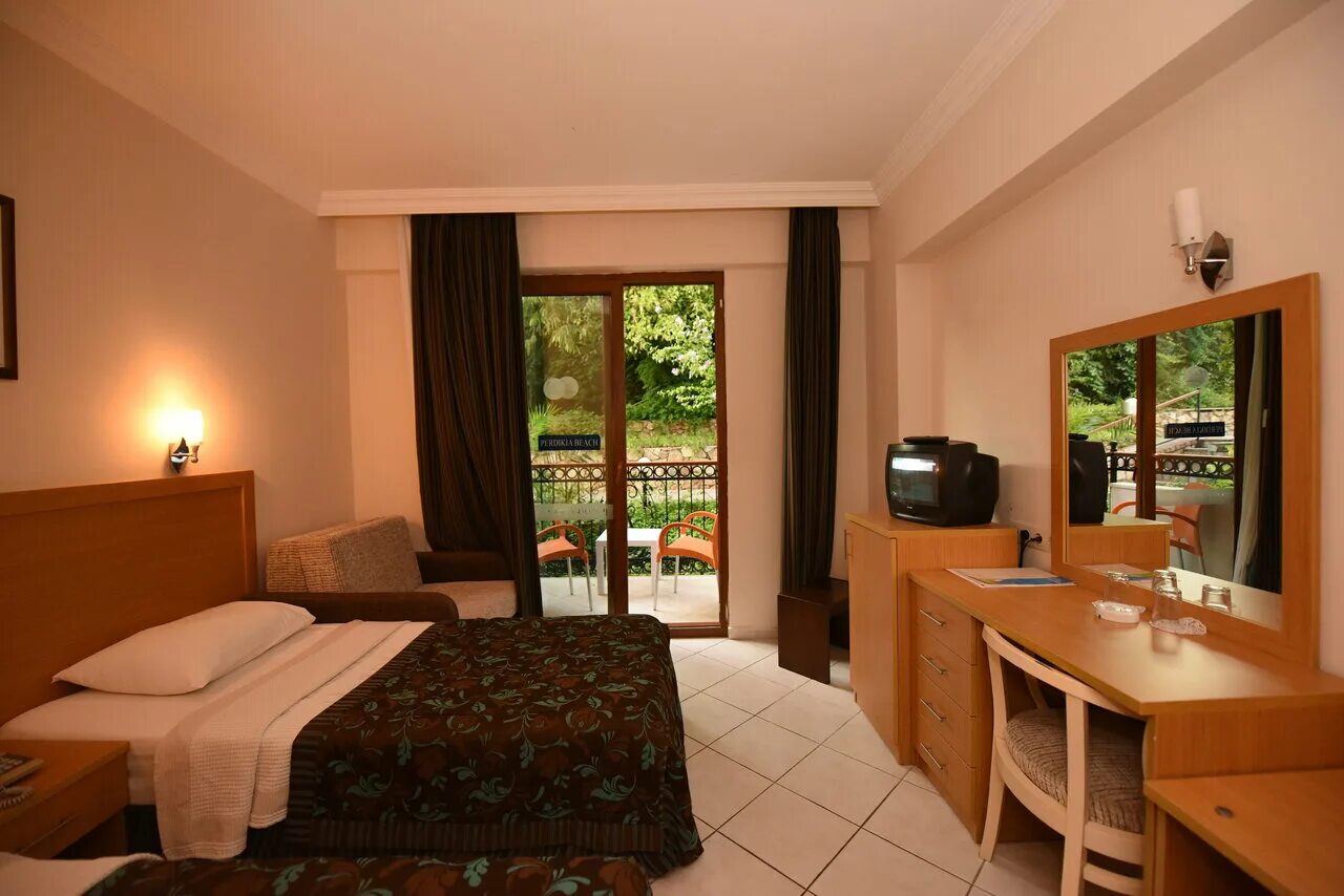 Олюдениз турция пердикия. Perdikia hill hotels & villas 4*. Пердика отель. Пердика отель. Perdikia beach hotel.