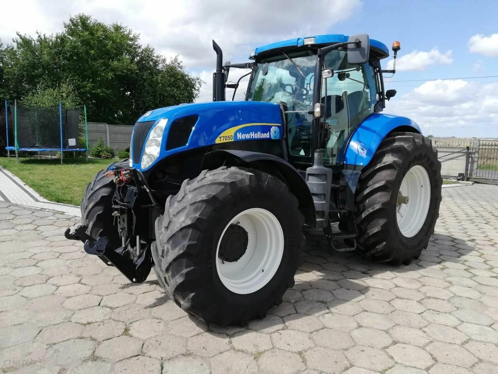 Трактор нью холланд т7. New holland t6000. Нью холланд трактор 7060. Трактор нью холланд 4-гусеничный. Трактор new holland t6070.