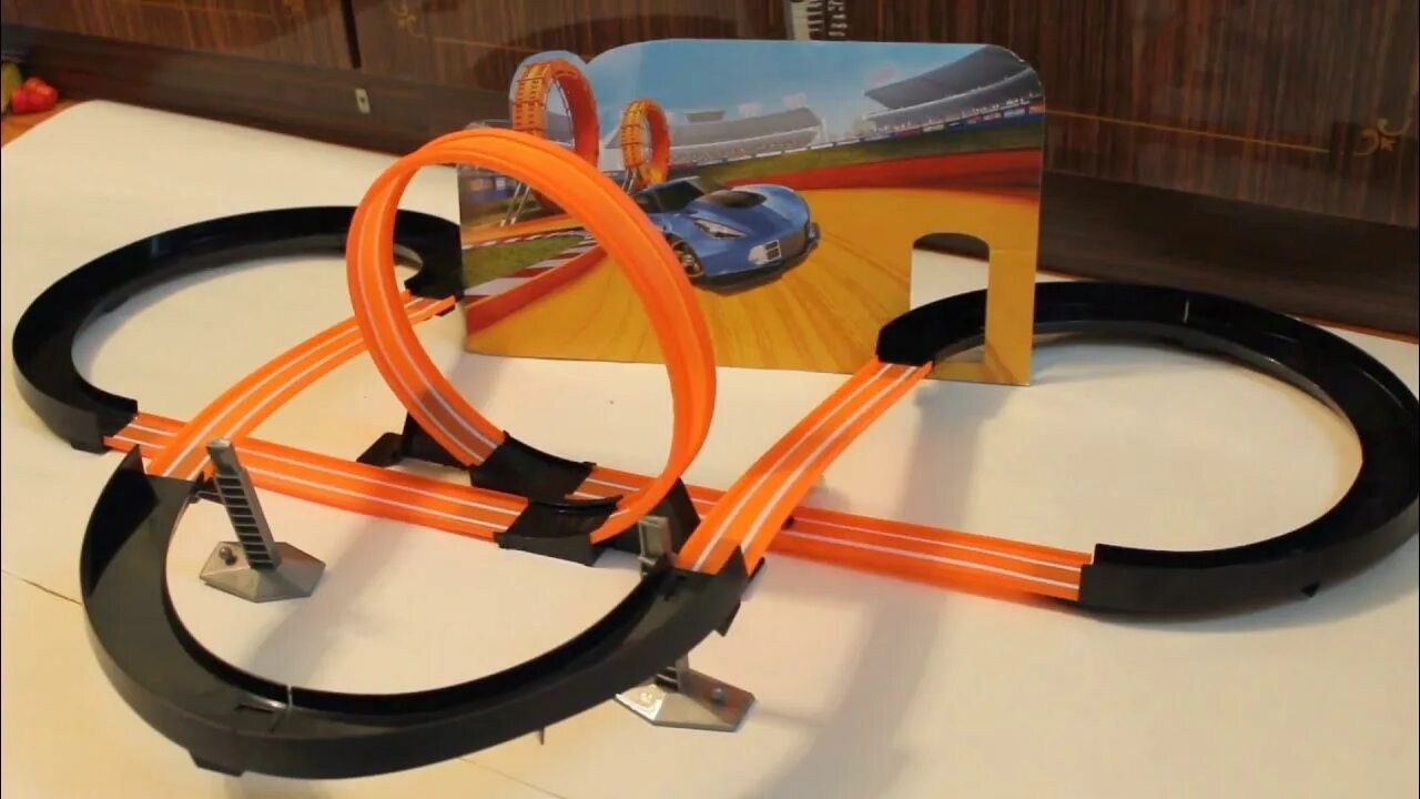 Хот Вилс кольцевой трек. Hot Wheels кольцевой трек. Трасса хот Вилс кольцевой трек. Хот Вилс трасса с двумя петлями.