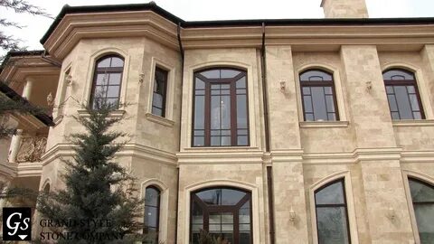 Фасад дома мрамором