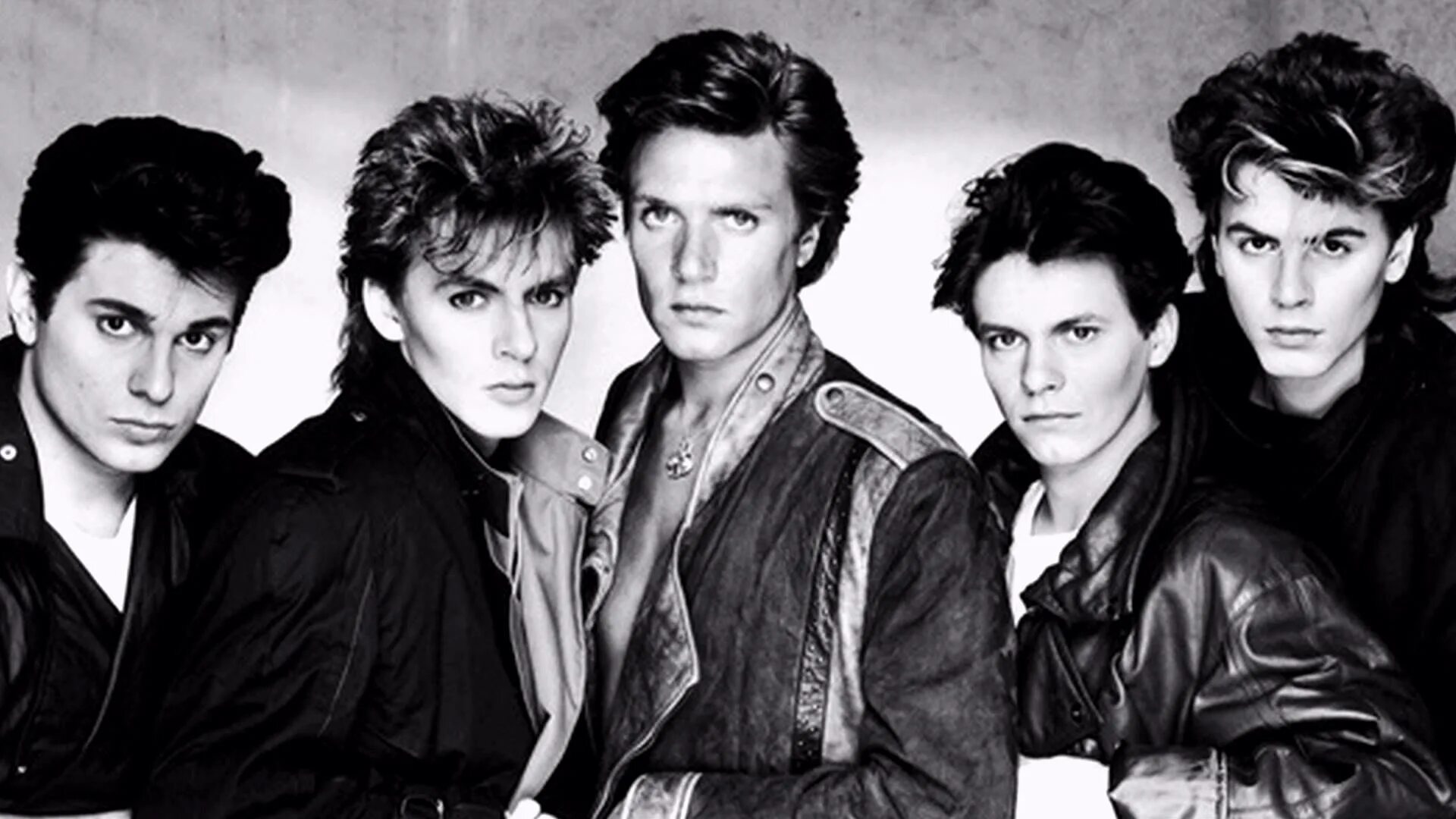 Старые группы 90. Группа Duran Duran. Группа Дюран Дюран фото. Группа Duran Duran 80. Уоррен Куккурулло Дюран Дюран.