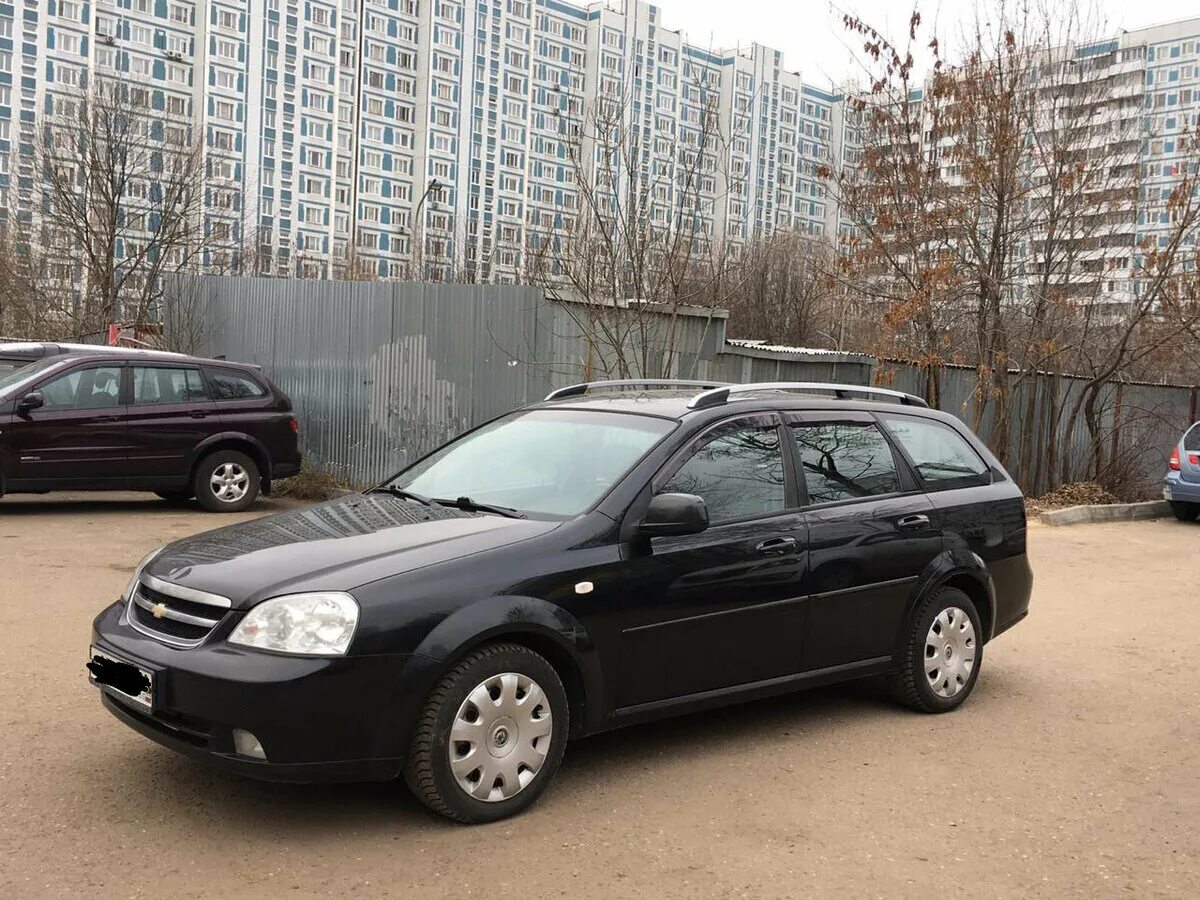 Лачетти универсал отзывы. Chevrolet Lacetti универсал 1.6. Шевроле Лачетти универсал 2010. Chevrolet Lacetti 2011 универсал черный. Chevrolet Lacetti универсал 1.6 2010.