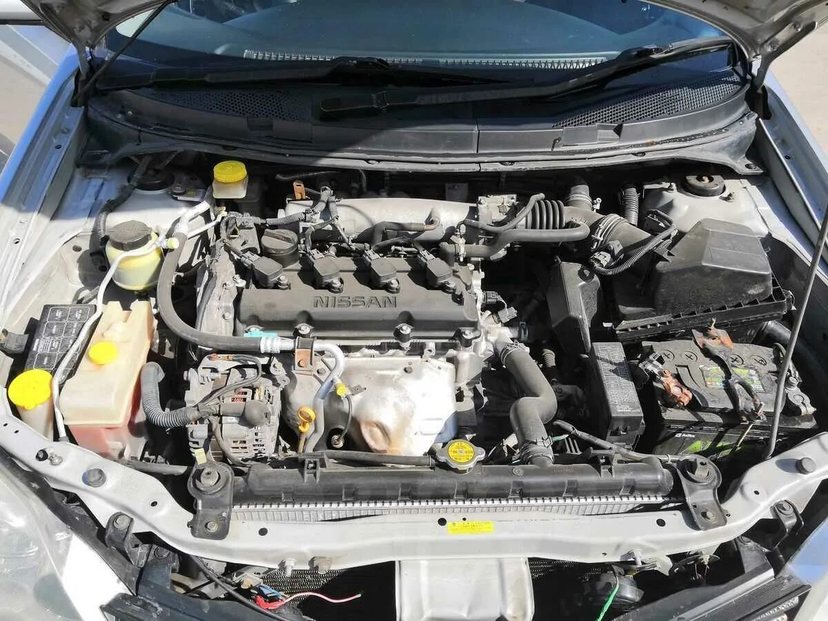 Где находится термостат на двигателе Nissan Serena KV S 23.