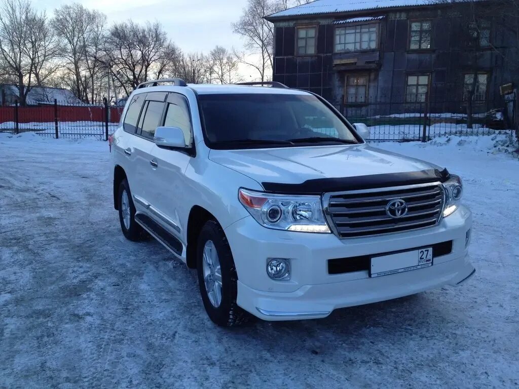 Land cruiser перевод. Toyota land cruiser 200 белый зимой. toyota land cruiser 200 белый зимо. тойота ленд крузер 210. ьайота лендкрузер 200 белый зимой.