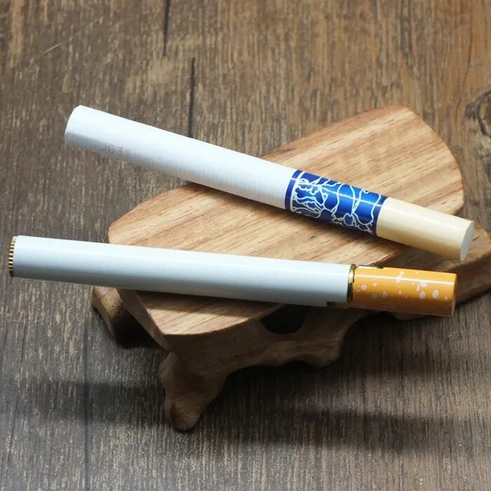 Необычные сигареты. Зажигалка в виде сигареты. Зажигалка в форме сигареты. Необычная форма сигарет.