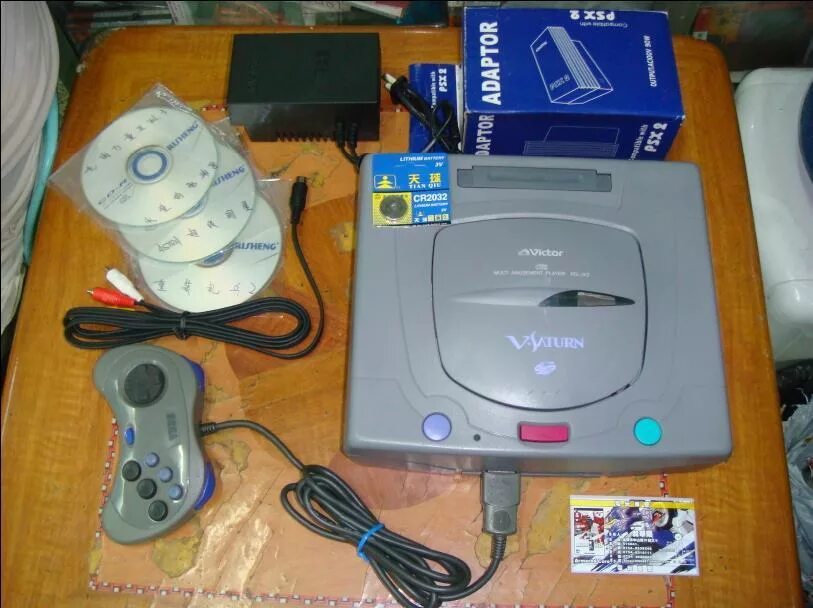 Sega saturn dp. Процессоры Sega Saturn. Sega SS-55. Сега с ручками. Сега Сатурн с монетками.