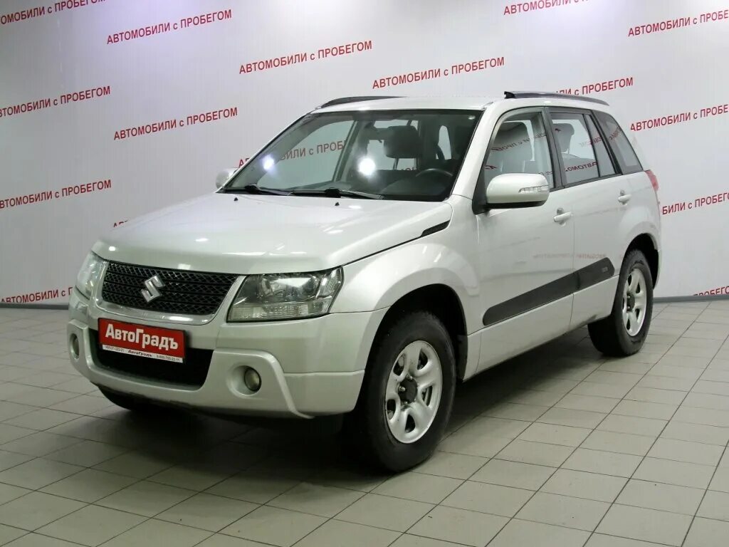 Автомобиль сузуки с пробегом. Suzuki Grand Vitara III Рестайлинг 2.0 4wd at (140 л.с.) бежевый с пробегом. Сузуки Витара 2010 года. Автосалон Автоград в Москве авто с пробегом. Автоград Москва Судзуки Витара.