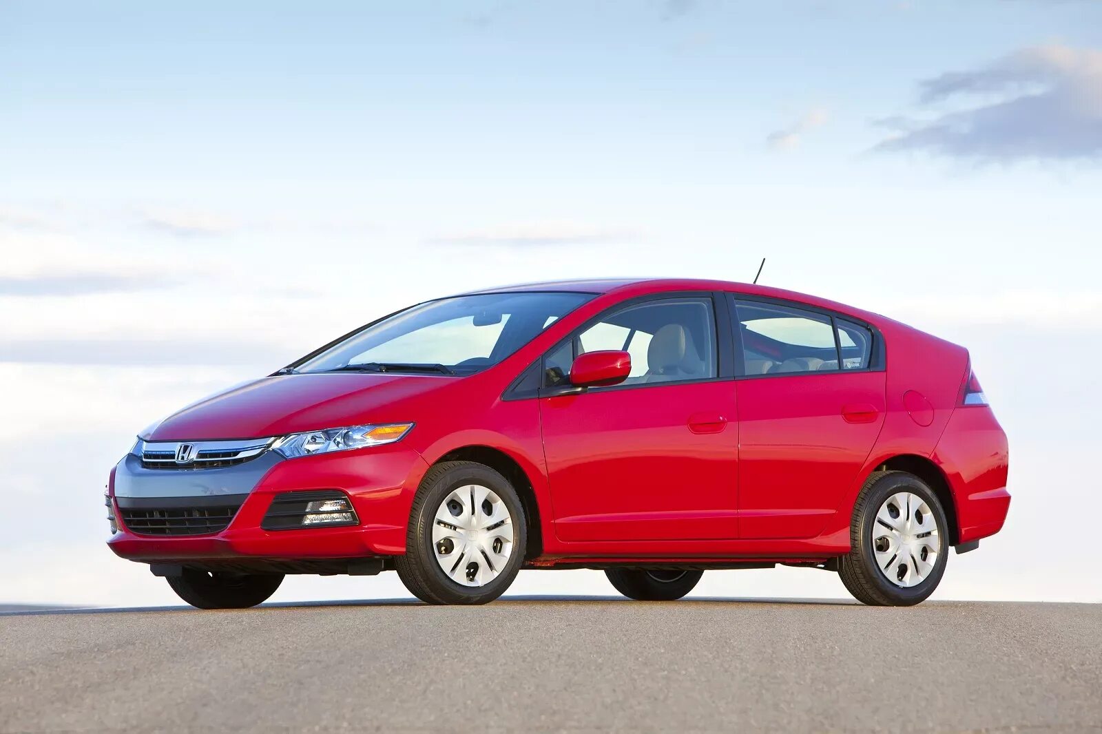 Инсайт 3. Хонда Инсайт гибрид 2013. Honda Insight Hybrid 2012. Honda Insight 3 поколение. Honda Insight 2010.