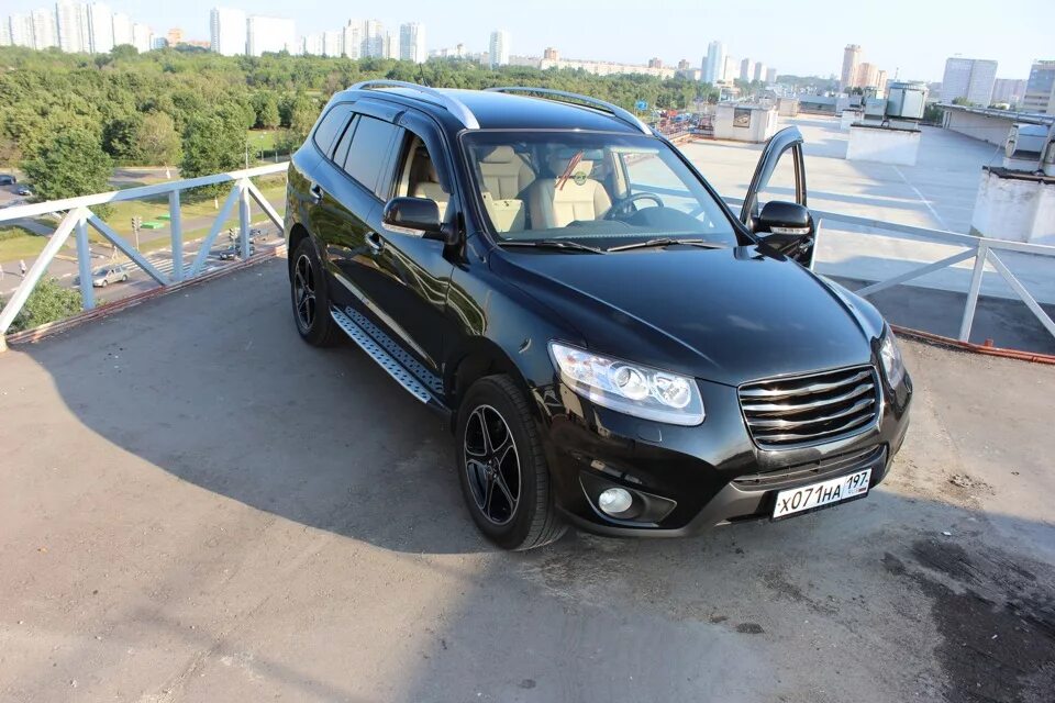 Тюнинг санта фе 2. Hyundai Santa Fe Tuning 2010. Хендай Санта Фе 2011 черный. Hyundai Santa Fe 2009 Tuning.