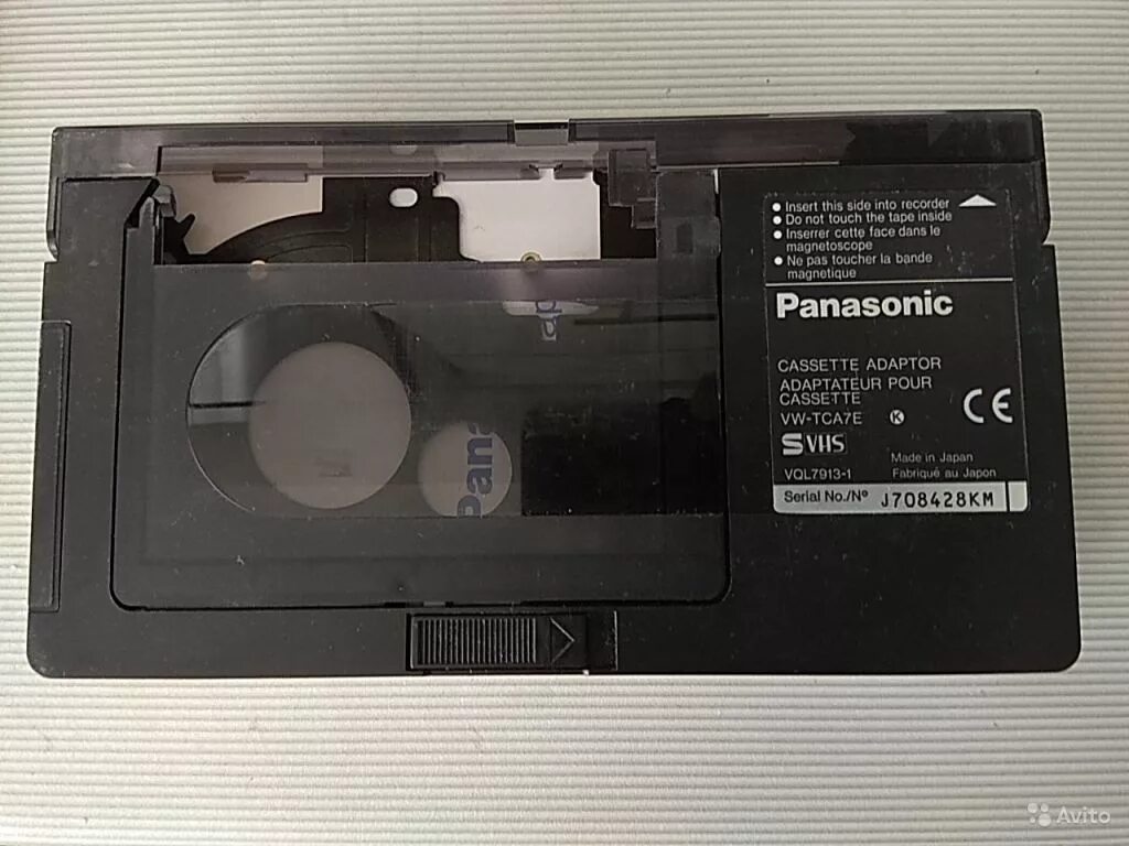 Vhs c кассета. Кассетный адаптер Panasonic VW-tca7e. Panasonic VHS-C кассета. Адаптер Panasonic VHS-C to VHS. VHS кассета адаптер Panasonic.