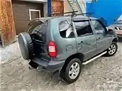 Нива Шевроле 2007. Нива Шевроле 2007г. 2007 Нива Шевроле 2007 сбоку. Chevrolet Niva 2007 тонировка 50%.