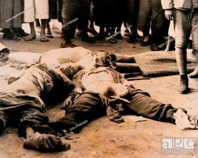 Stock Photo - Chinese Victims with Japanese Soldier at Right, Nanking Massa...
