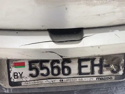 Помяли номер на машине