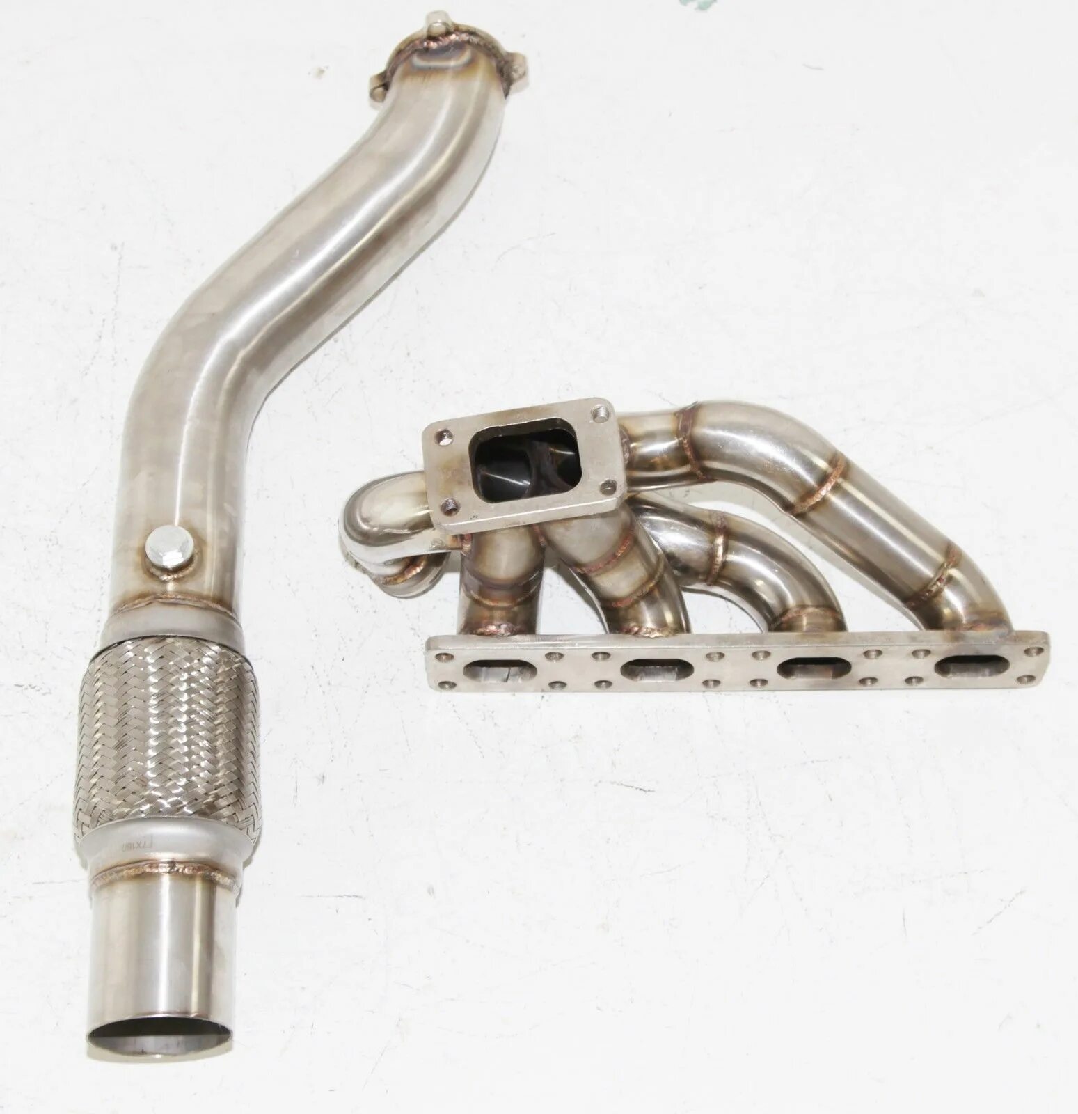 M44 турбо коллектор. BMW m44 Manifold. Турбо коллектор м43 БМВ. N42 Turbo Kit.