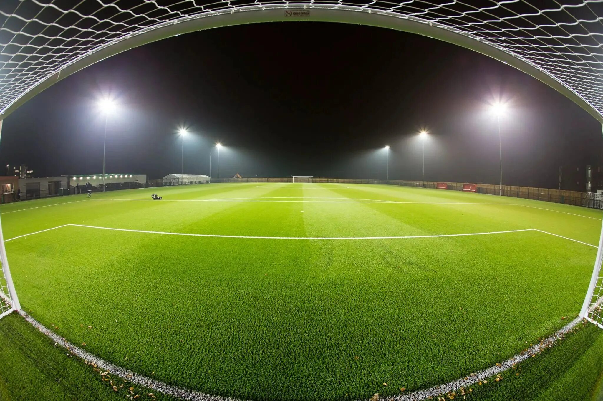 Stadion. Футбольные поля в Имеретинке. Футбольное поле фон. Футбольное поле с воротами. Футбольный стадион с воротами.