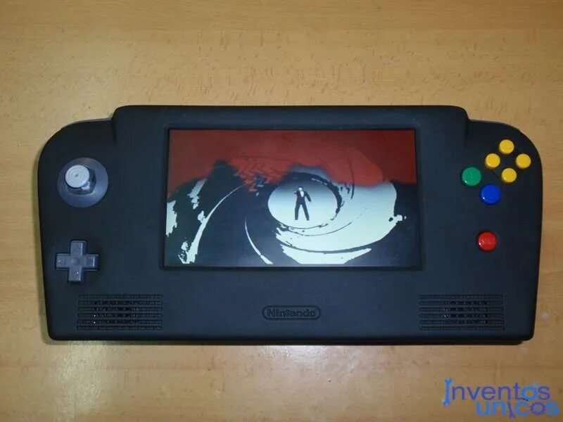 Создать игровую консоль. Nintendo 64 портативная. nintendo приставка старая. nintendo старая консоль. старая портативная консоль нинтендо.