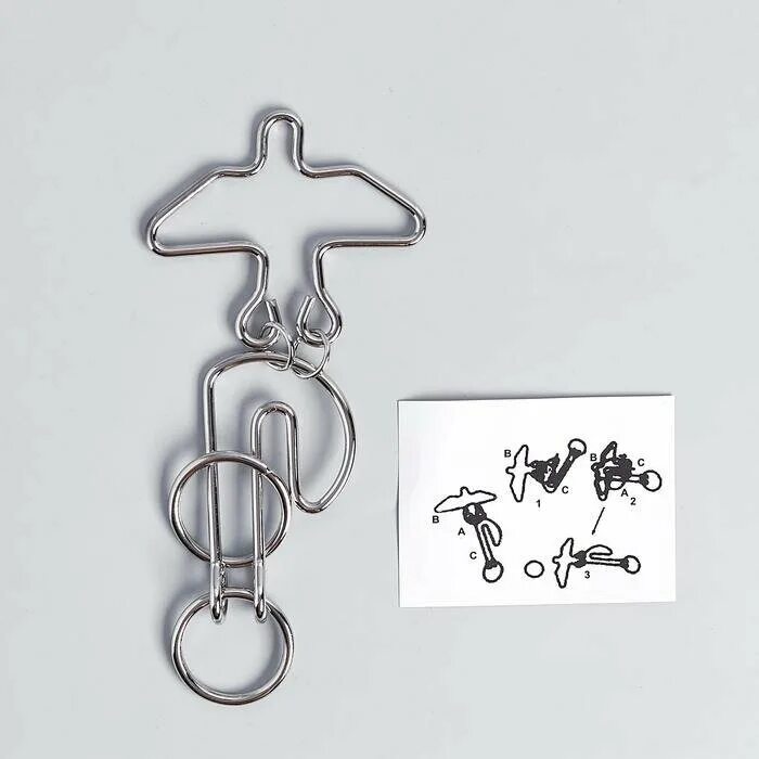 Головоломка треугольники. Деревянная головоломка ромб. Eureka мини головоломка 9. Головоломка 23. Игрушка развивающая "3d пазл" №1 (23 элемента) (в сеточке) 93646.