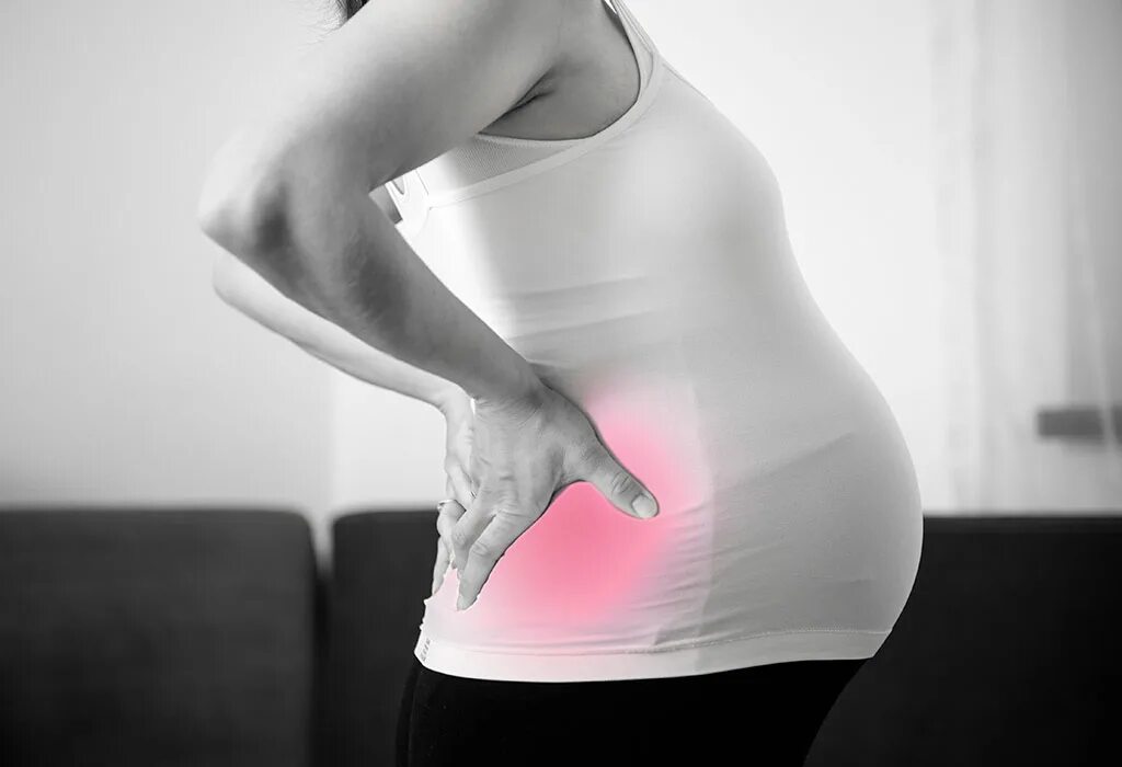 Боль в пояснице при беременности на ранних. Боли при беременности. Беременные со спины. Походка беременной женщины.