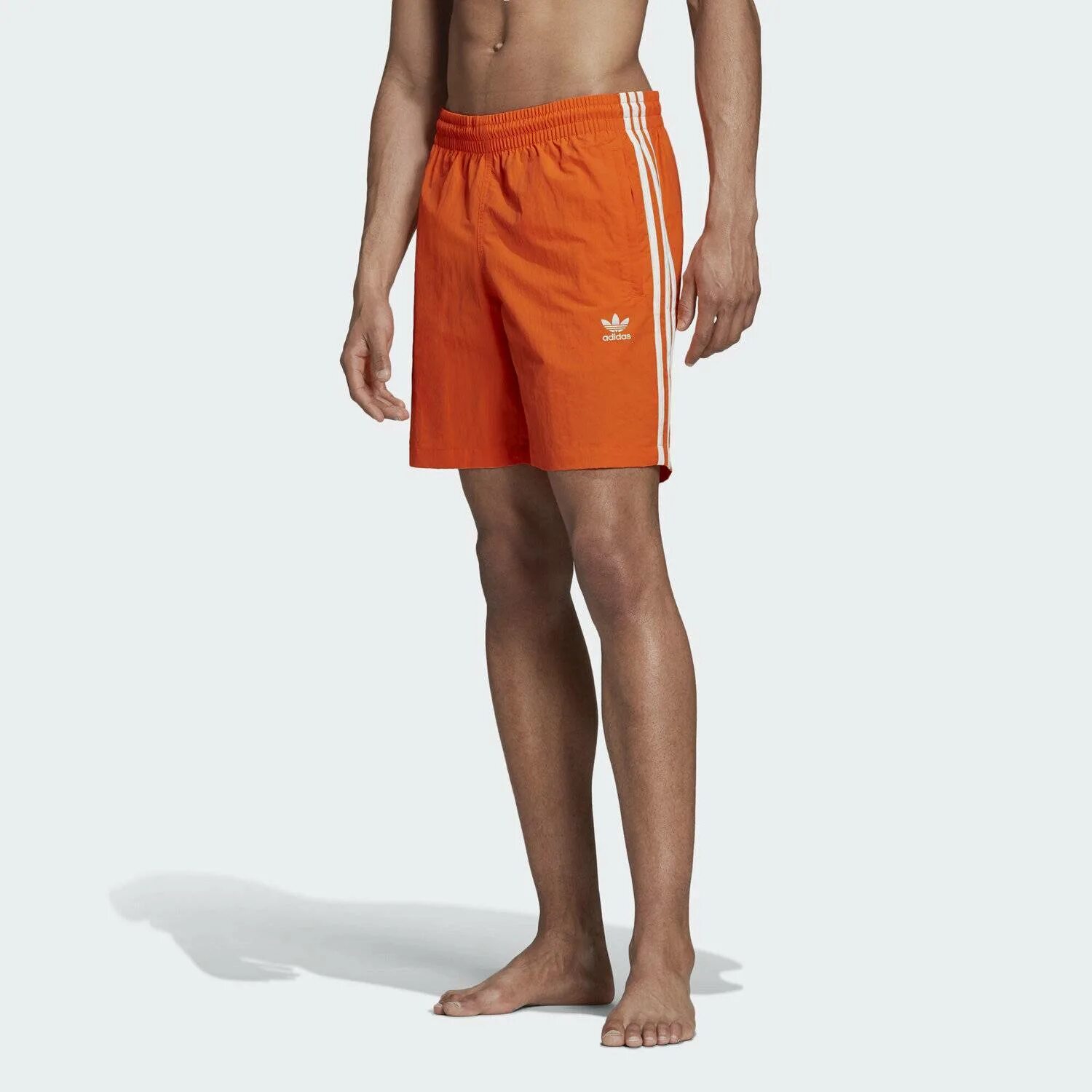 Originals шорты. Шорты адидас оранжевые мужские. Adidas Originals 3-Stripes Swim shorts. Шорты адидас ориджинал мужские плавательные. Шорты adidas Performance Orange.