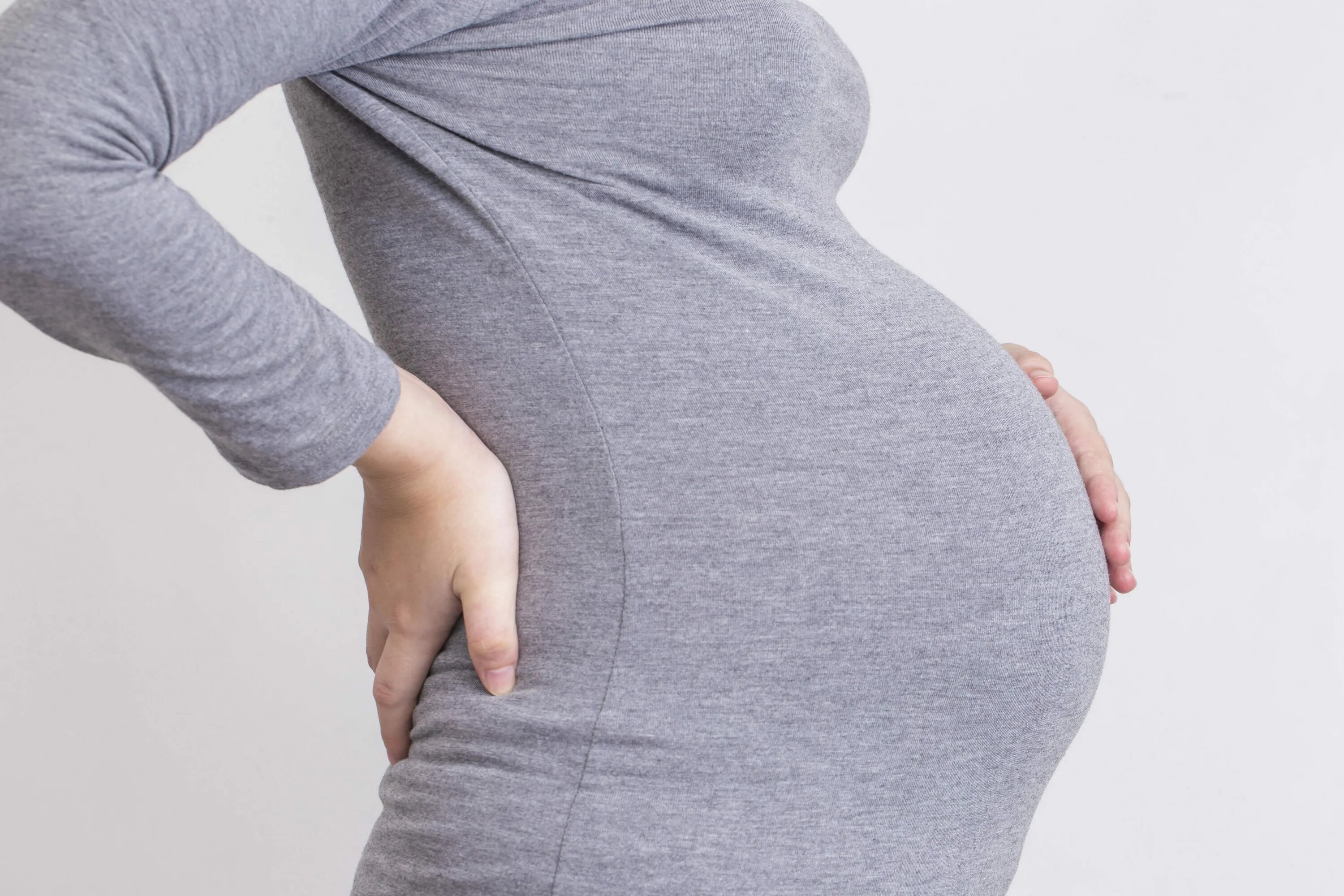 Болит поясница беременность 39. Беременные. Беременные со спины. Картинки беременных женщин.