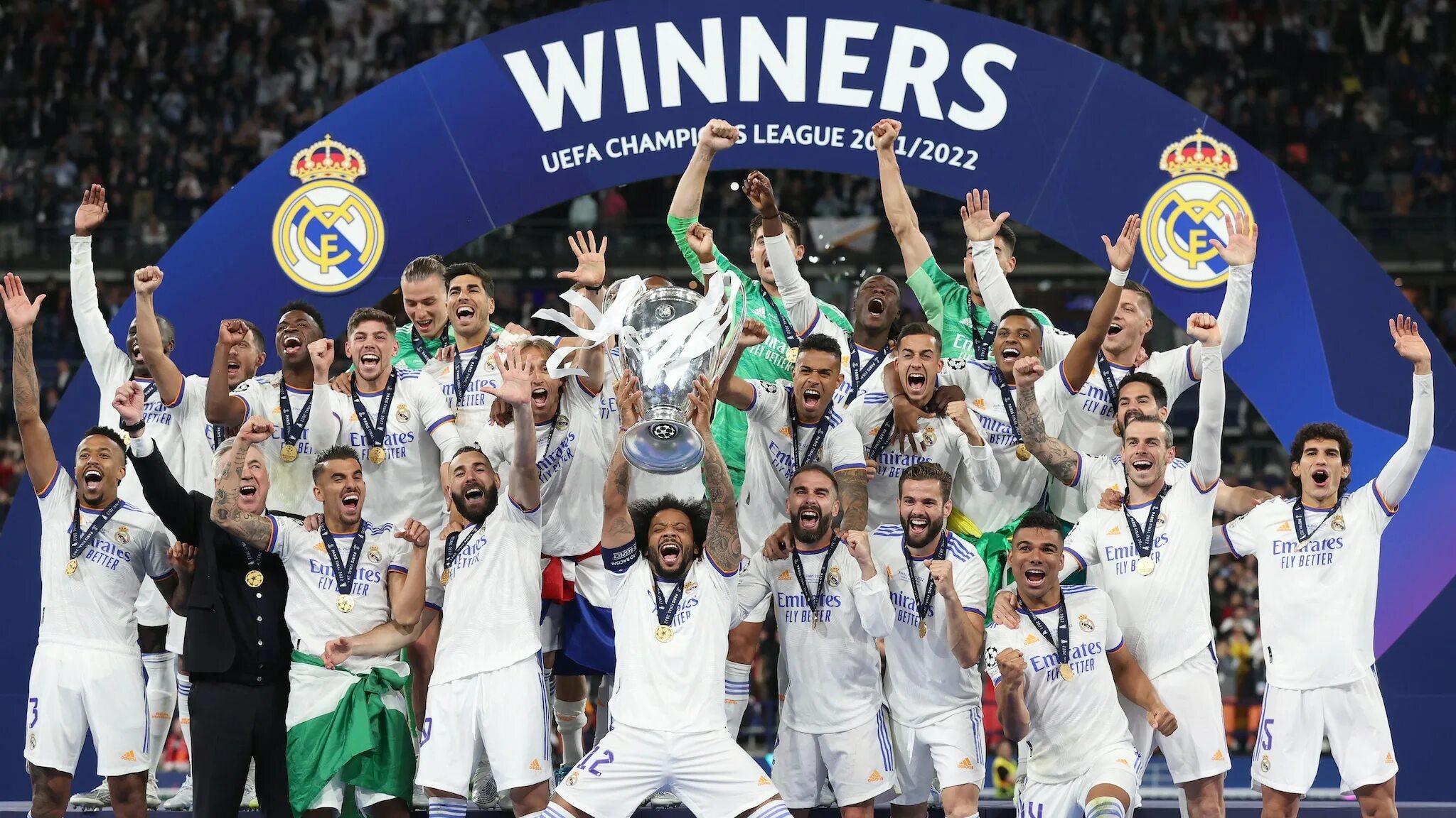 Реал лига уефа. Реал Мадрид победитель Лиги чемпионов 2022. Реал Мадрид лига чемпионов 2022 финал. Реал Мадрид с Кубком ЛЧ 2022. Реал Мадрид чемпион 2022.