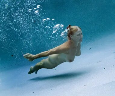 Nude female swimmers.