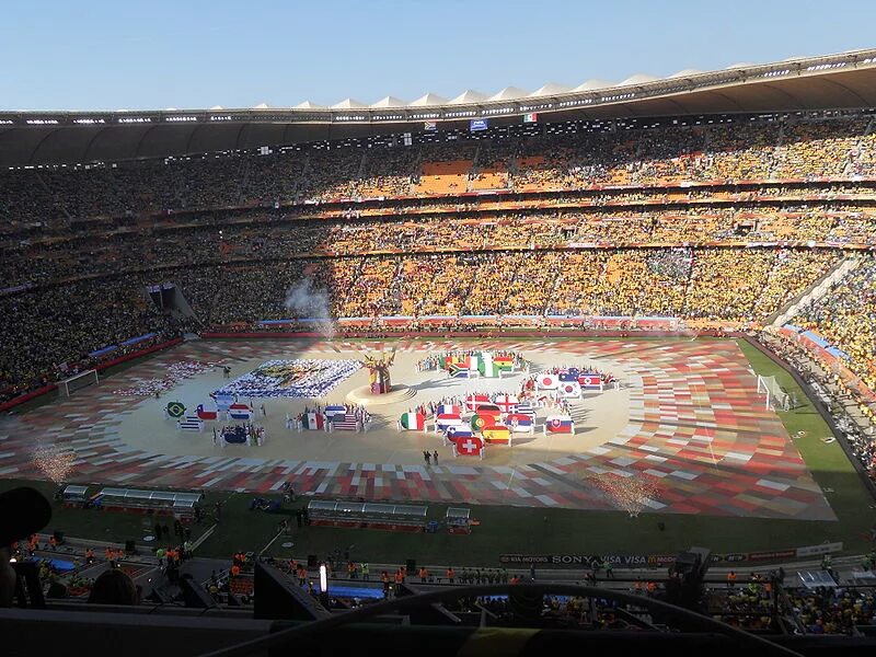 Самый большой стадион. СОККЕР Сити стадион. "СОККЕР Сити" (FNB Stadium). Стадион СОККЕР Сити 1996. Самый большой футбольный стадион мира.