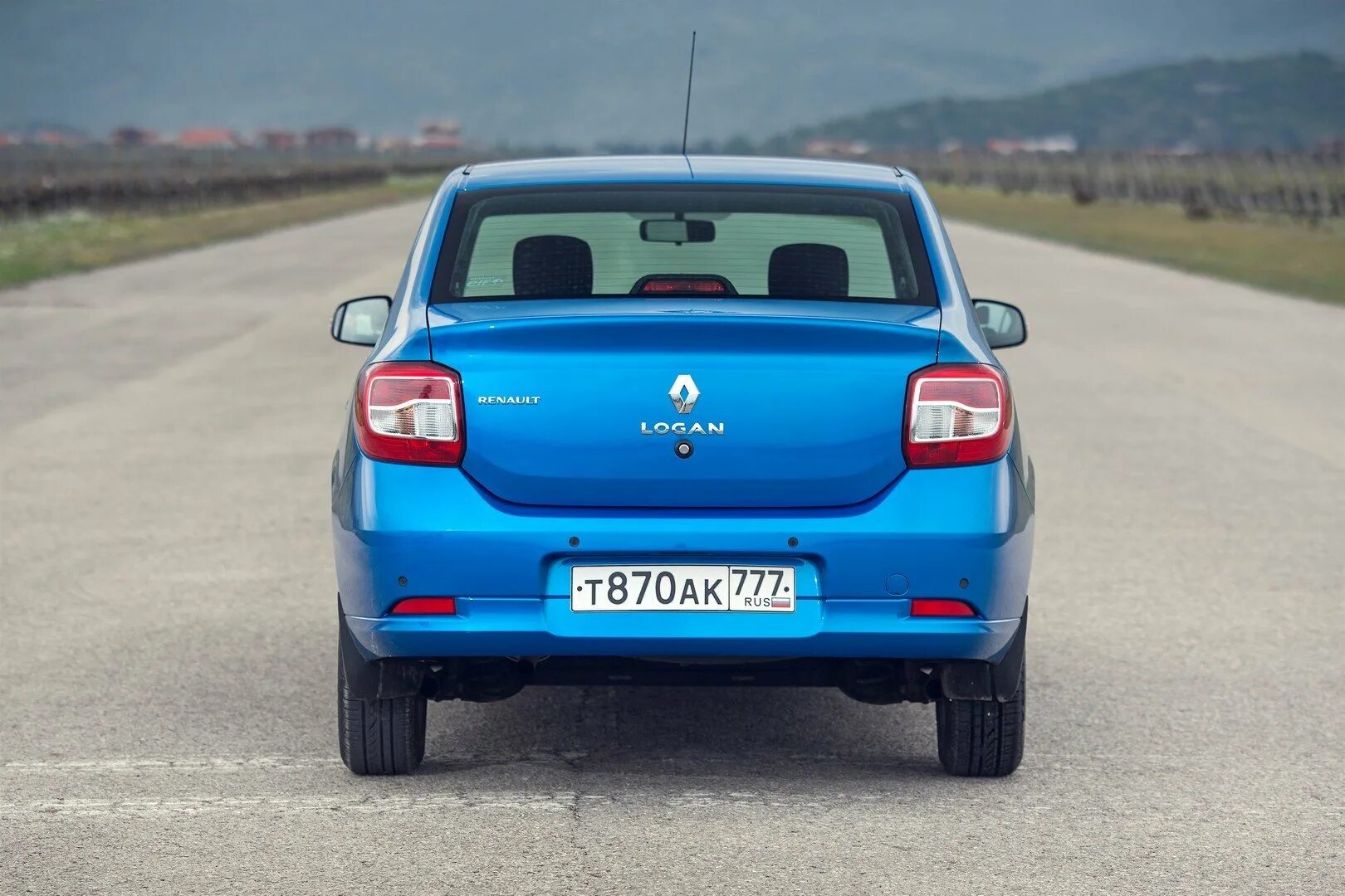 Рено логан 7 года. Рено Логан 2 зад. Renault Renault Logan 2015. Рено Логан 1 зад.