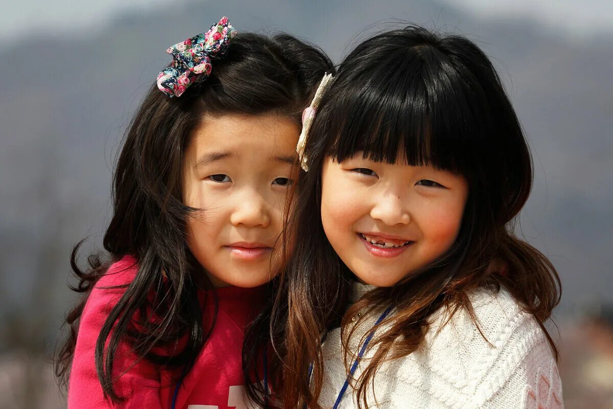 Русские азиатки. Ребенок азиатской внешности. Корейский ребенок улыбается. Дети русского и азиатки.