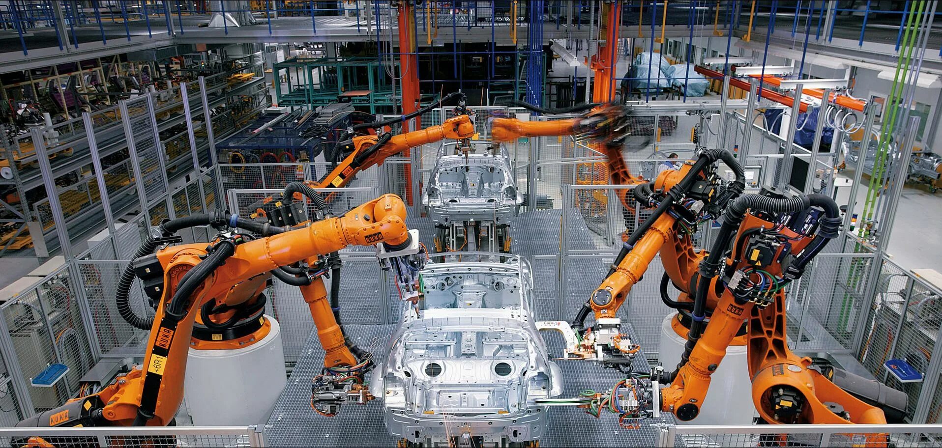 Цех роботов. Промышленные роботы. Роботизация промышленности. Роботы в промышленности. Робототехника в промышленности.