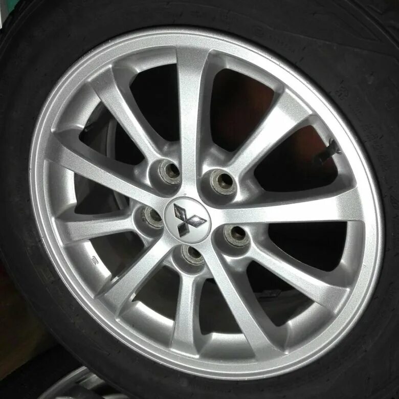 диски лансер 10 оригинал. диски митсубиси лансер 10 r16. диски лансер 10 черные оригинальные. оригинальные диски лансер 10. диски на лансер 10 r16.