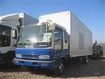 Грузовик дром амурская. Isuzu forward 2000 фургон. Исузу форвард 2000. Isuzu forward 2000 фургон салон. Исузу форвард 2000 год ширина кабины.