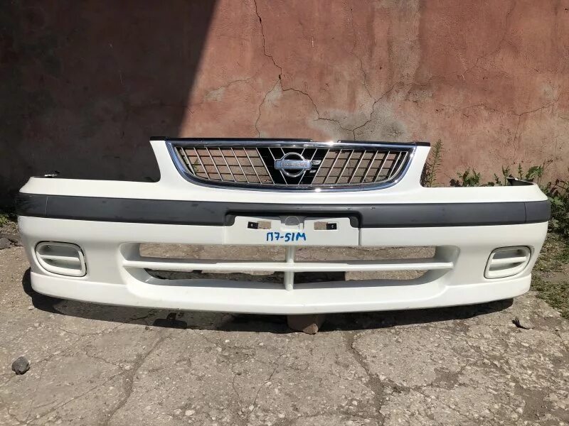 Ремонт бампера ниссан. Бампер Nissan Sunny b15. Бампер Ниссан Санни fb15. Бампер задний Ниссан Санни fb15. Ниссан Авенир бампер 2000.