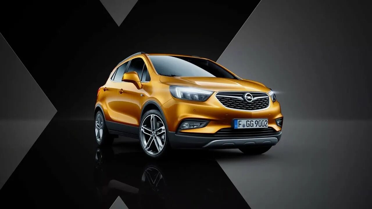 Опель сколько лошадей. Opel Mokka x. Реклама Опель. Реклама Опель Мокка. Opel Mokka x 2016 обои на рабочий экран телефона.