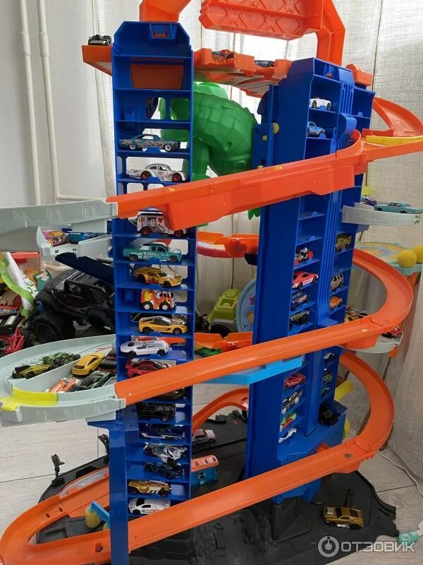 Гараже вилс. Hot Wheels Сити новый невообразимый гараж gjl14. Набор игровой hot Wheels Сити невообразимый гараж. Гараж хот Вилс. Трек hot Wheels gjl14.