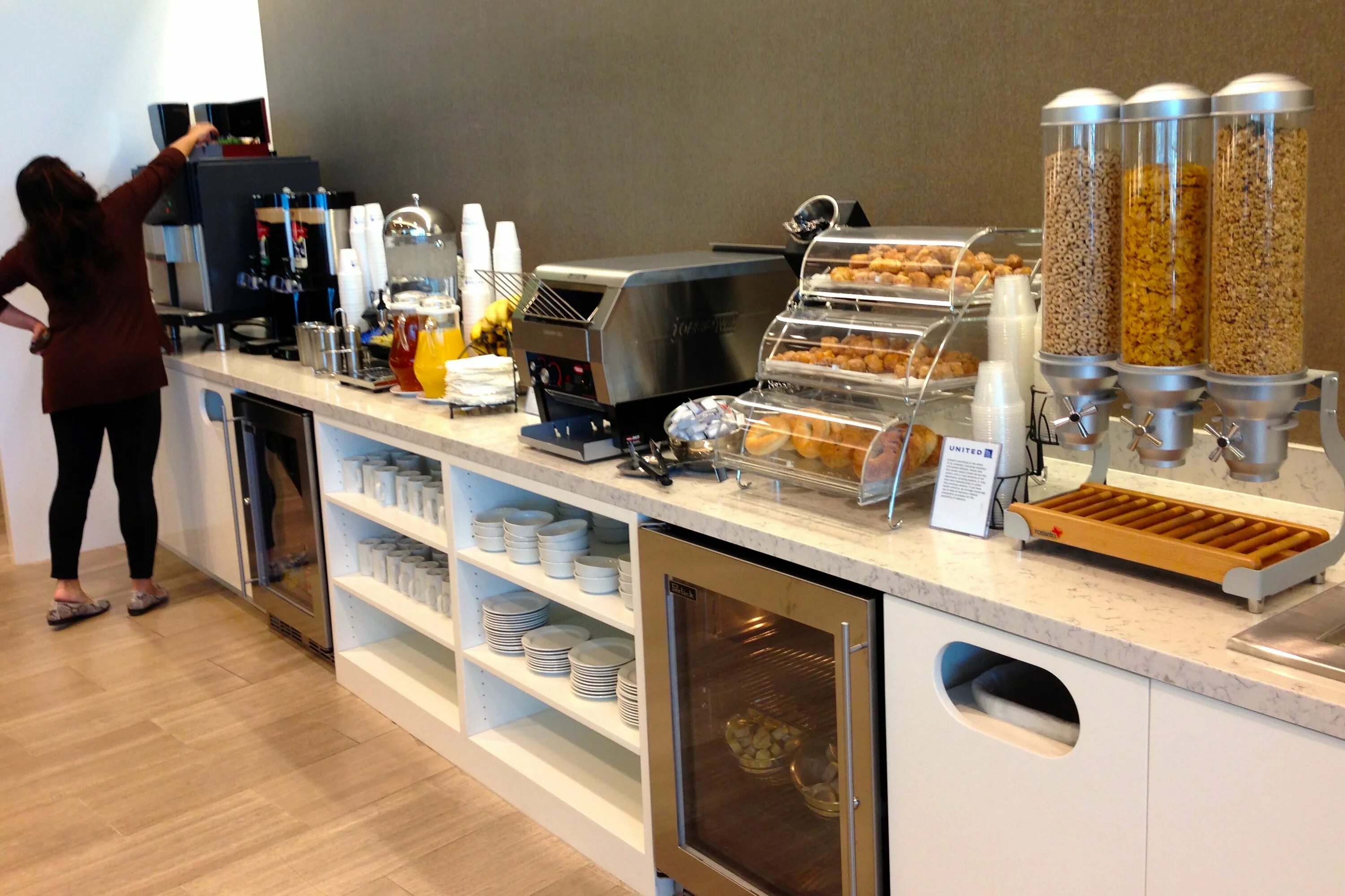 San Diego Airport. Self service Cafe Table. Lounger food. Self service shop