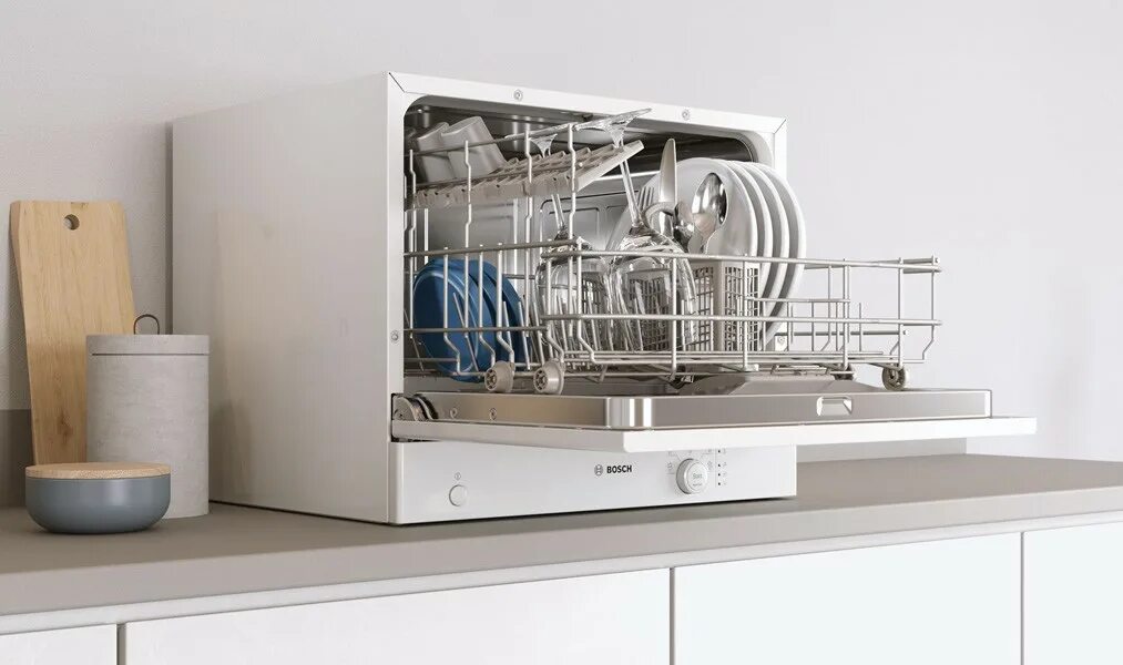 Какую посудомоечную встраиваемую купить. Компактная встраиваемая посудомоечная машина Bosch. Посудомоечная машина Bosch sks62e22. Компактная посудомоечная машина Bosch SKS. Посудомоечная машина бош компактная маленькая.