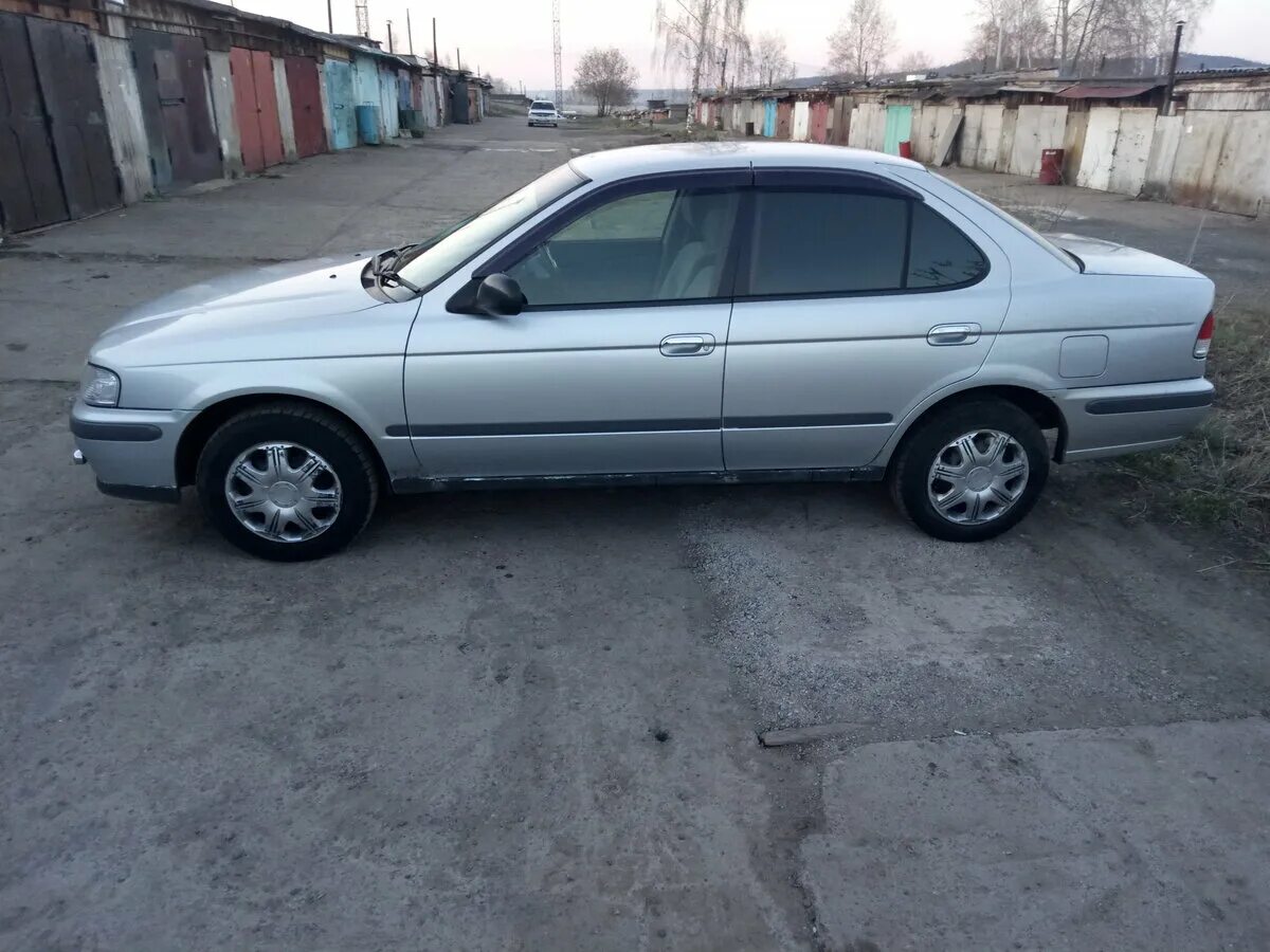 Ниссан санни иркутск. Ниссан Санни в15. Nissan Sunny 15. Nissan Sunny b15 1999. Nissan Sunny 1999 год.