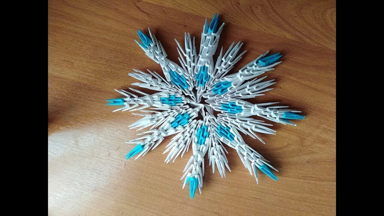 снежинка из модулей оригами. снежинка модульное оригами из бумаги. снежинка из бумажных модулей. снежинка из бумажных модулей. снежинка из бумажных модулей.