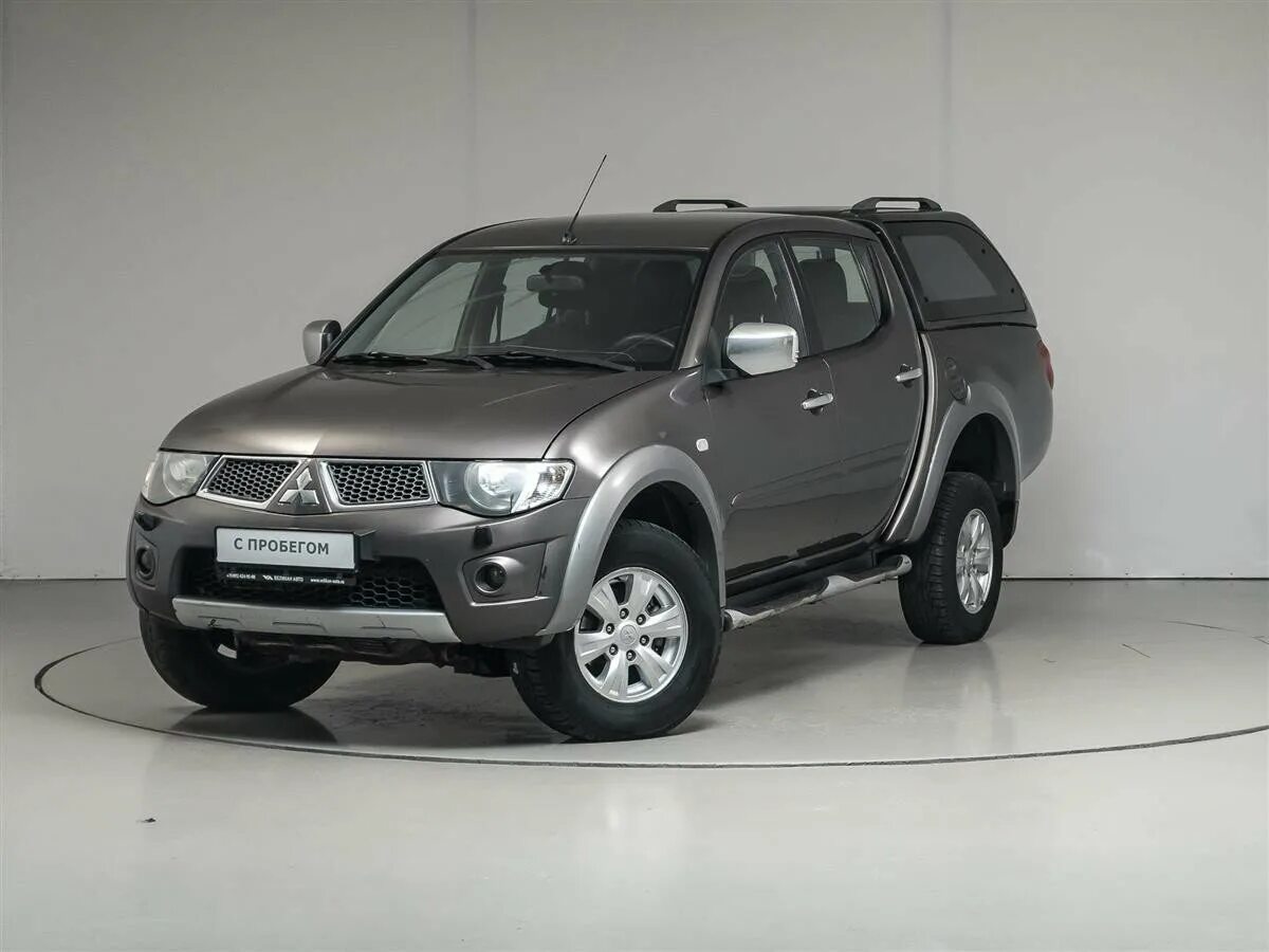 Mitsubishi l200 2.5. Мицубиси l200 2013. Митсубиси л200 2013. Mitsubishi l200 IV Рестайлинг. Мицубиси л200 2013 года.