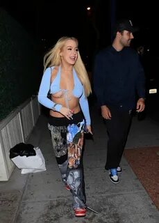 Tana Mongeau Flashes Her Boobs at Delilah (12 Photos + Video) .