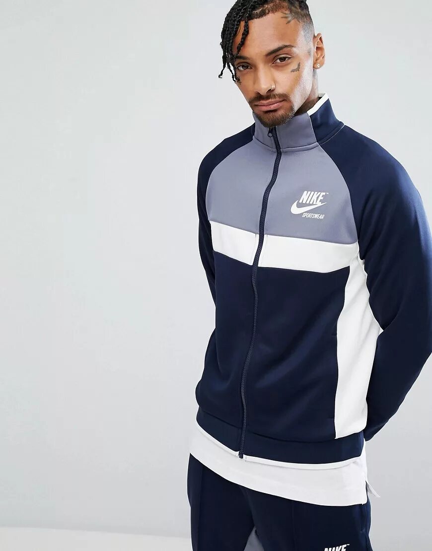 Nike tracking. Nike Archive track Jacket. Nike Sportswear олимпийка. Олимпийка Nike Sportswear голубая. Олимпийка ACG мужская Nike.