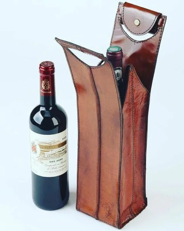 Винная кожа. Wine bottle leather carrier bag. кожаный чехол для бутылки. упаковка для бутылки вина. кожаный футляр для бутылки.