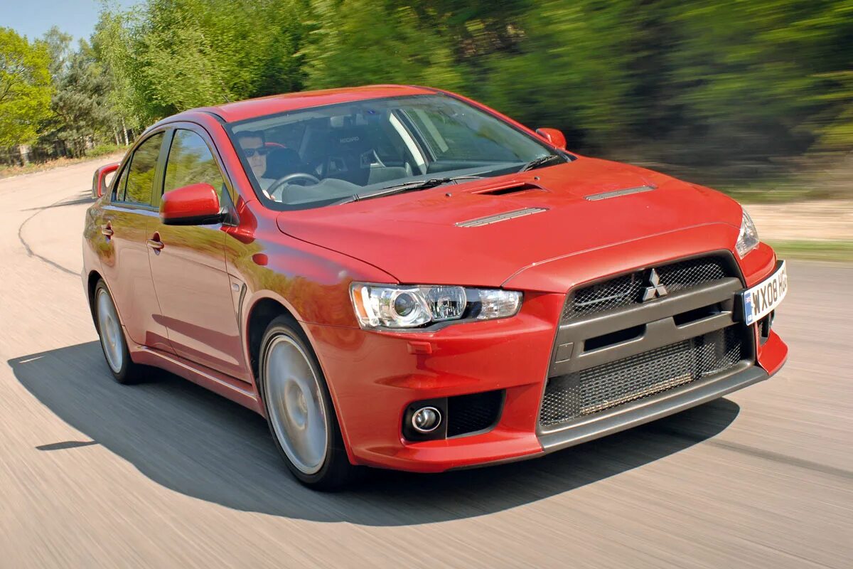 Как выглядит mitsubishi. Mitsubishi Lancer 10. Мицубиси ланцер 10. Митсубиси Лансер 10 EVO. Mitsubishi Lancer Эво 10.