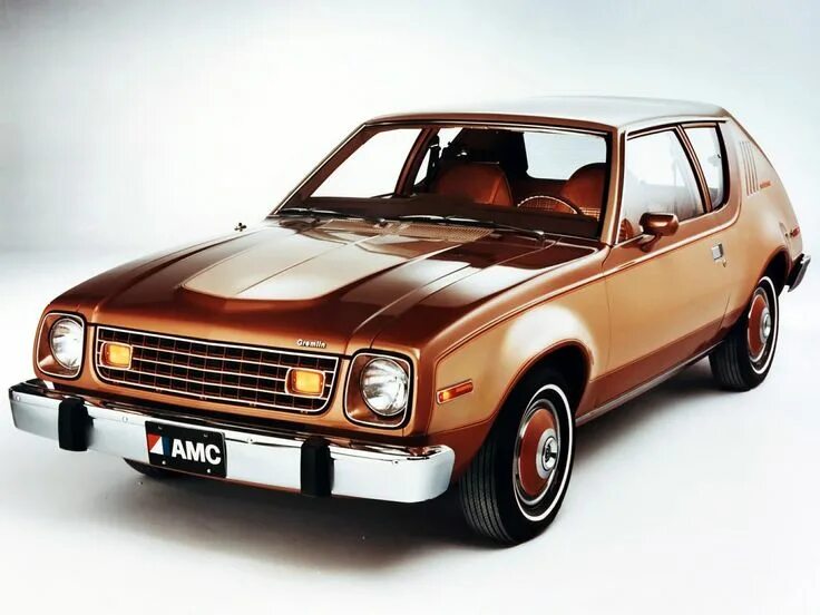 Amc gremlin 1975. Амс пейсер. Amc gremlin v8. Автомобиль амс. Amc gremlin 1977.