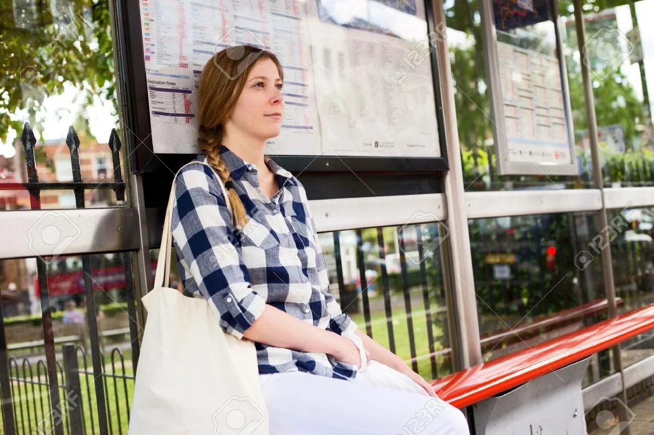 Were waiting a bus. Wait for a bus. waiting for a bus. wait bus stop. wait for the bus at the bus stop.