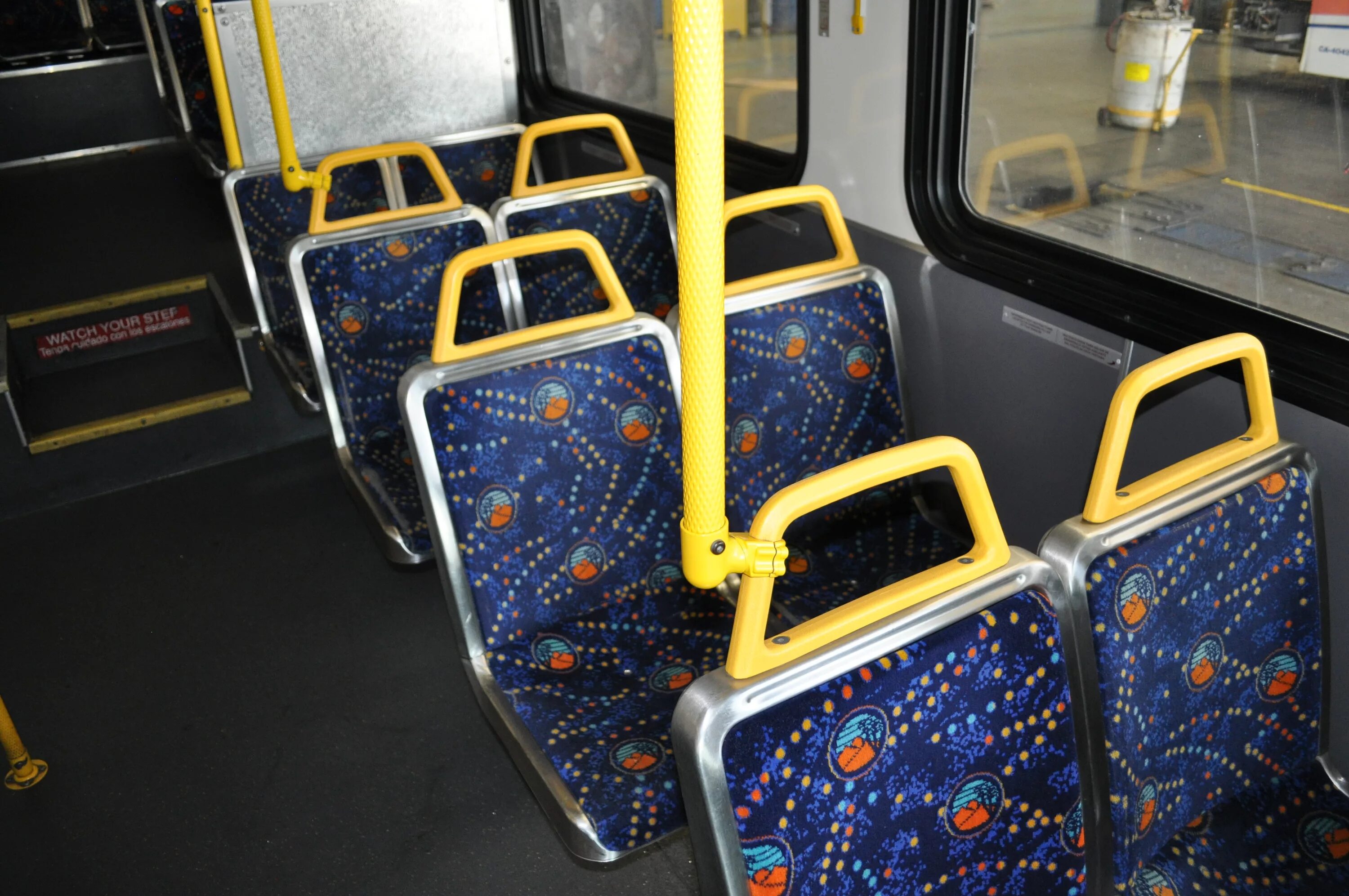 Bus seats. Bus 32 Seats. Seats on the Bus. An empty Seat on the Bus.