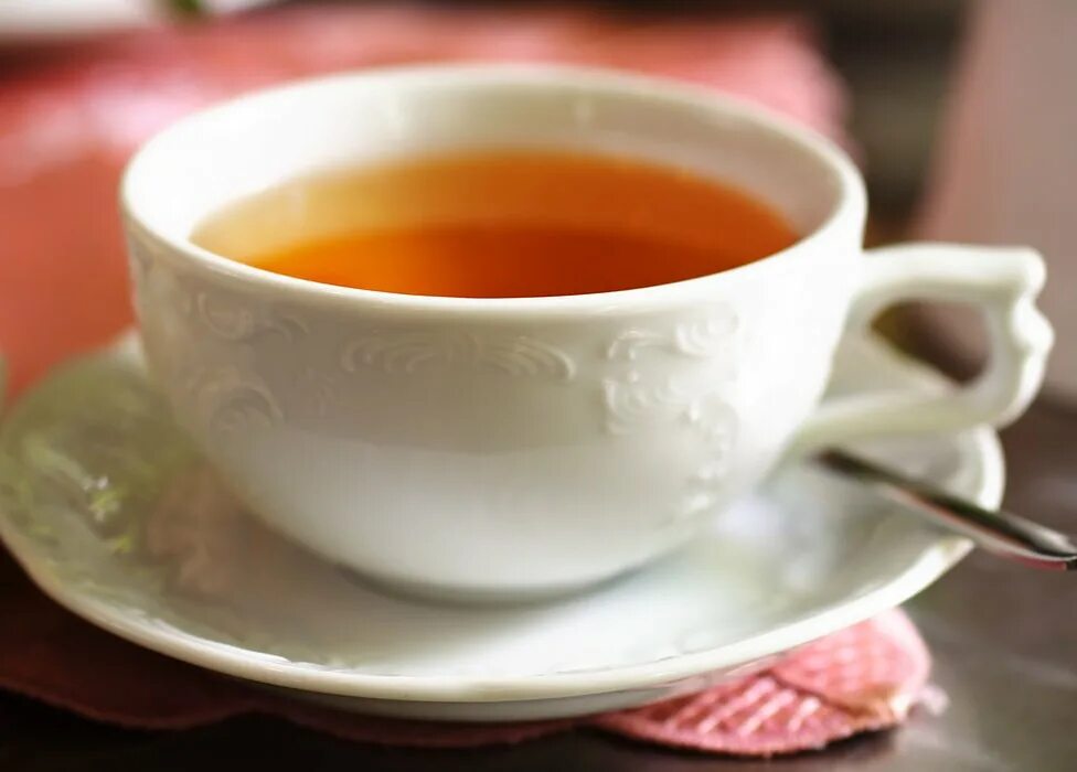 A cup of liber tea. Чашка чая. Чашка чая на Светлом фоне. Чай черный в кружке. Чашка чая вид спереди.