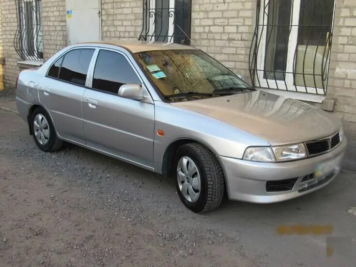 Mitsubishi Lancer 2000 серебристо. Митсубиси Лансер 2000 года. Мицубиси Лансер 2000 года цена. Лансер 2000 года