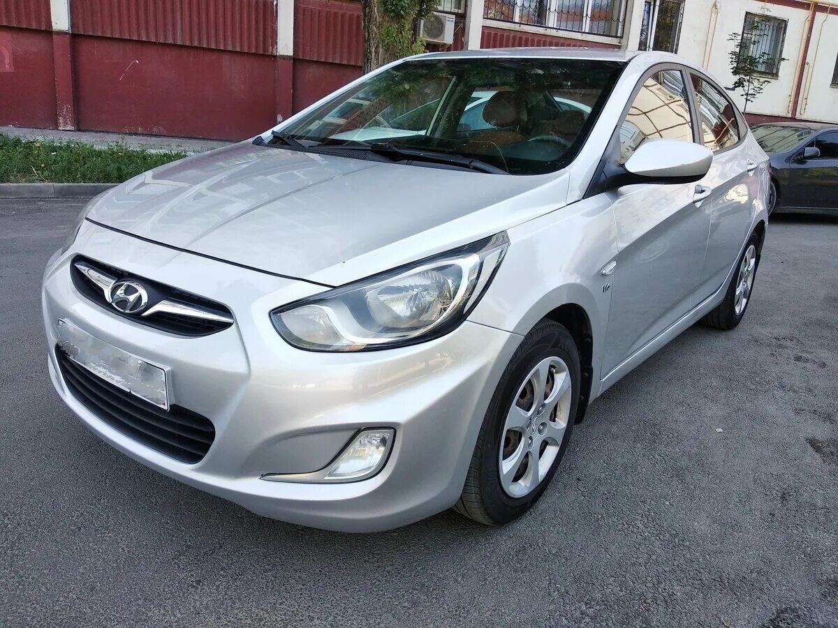 Хендай солярис 2012 1.4. Hyundai Solaris 2012. Hyundai Solaris i 2012. Хюнлай Солярис 2012. Solaris 2012 седан.